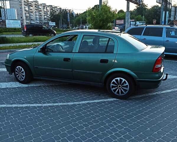 Зеленый Опель Астра, объемом двигателя 1.6 л и пробегом 408 тыс. км за 3200 $, фото 7 на Automoto.ua