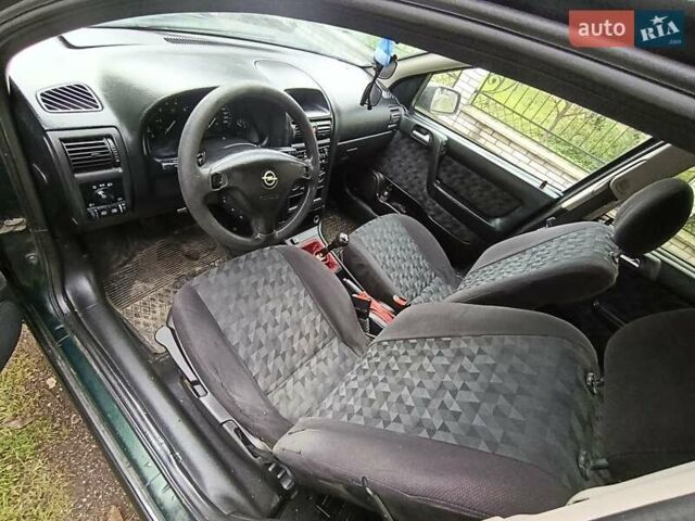 Зеленый Опель Астра, объемом двигателя 1.6 л и пробегом 314 тыс. км за 2450 $, фото 11 на Automoto.ua