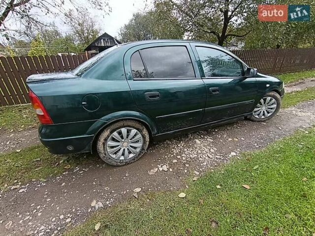 Зеленый Опель Астра, объемом двигателя 1.6 л и пробегом 314 тыс. км за 2450 $, фото 10 на Automoto.ua