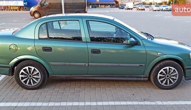 Зеленый Опель Астра, объемом двигателя 1.6 л и пробегом 410 тыс. км за 2900 $, фото 3 на Automoto.ua