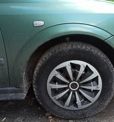 Зеленый Опель Астра, объемом двигателя 1.6 л и пробегом 410 тыс. км за 2900 $, фото 10 на Automoto.ua