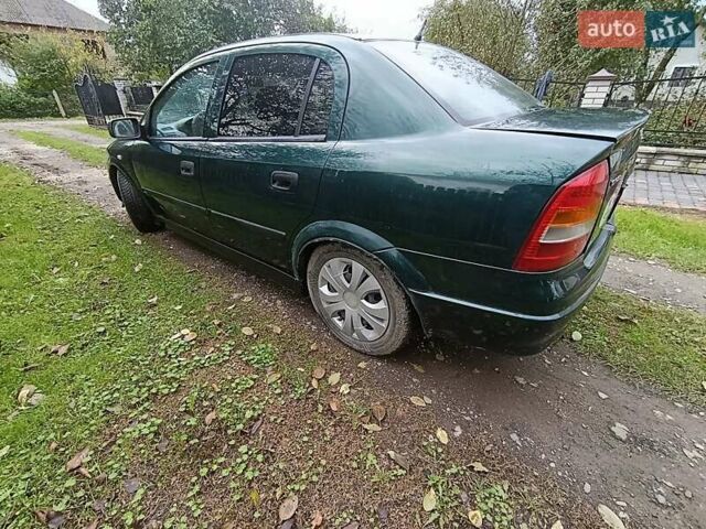 Зеленый Опель Астра, объемом двигателя 1.6 л и пробегом 314 тыс. км за 2450 $, фото 5 на Automoto.ua