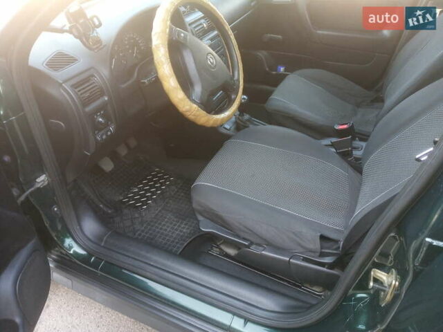 Зеленый Опель Астра, объемом двигателя 1.6 л и пробегом 269 тыс. км за 4600 $, фото 17 на Automoto.ua