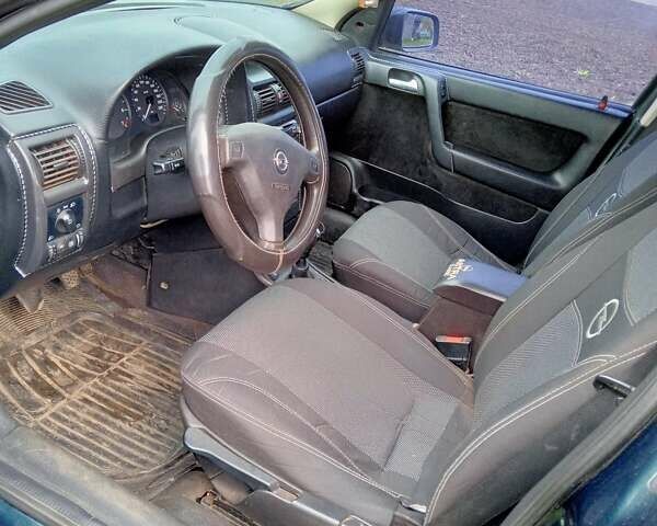 Зеленый Опель Астра, объемом двигателя 1.6 л и пробегом 266 тыс. км за 3700 $, фото 3 на Automoto.ua