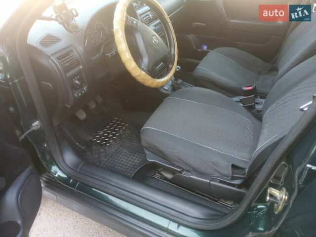 Зеленый Опель Астра, объемом двигателя 1.6 л и пробегом 269 тыс. км за 4600 $, фото 18 на Automoto.ua