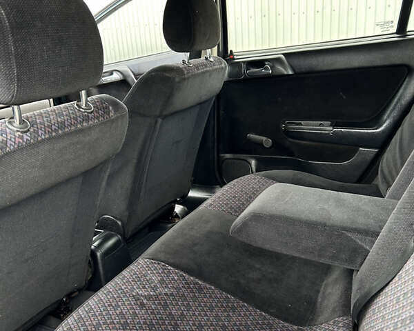 Зеленый Опель Астра, объемом двигателя 1.4 л и пробегом 262 тыс. км за 4000 $, фото 10 на Automoto.ua