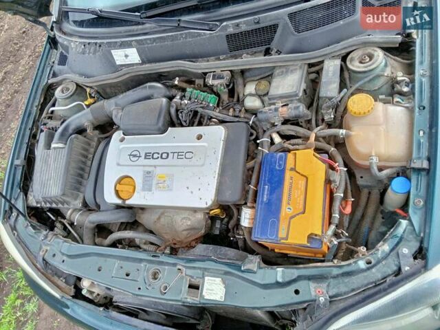 Зеленый Опель Астра, объемом двигателя 1.6 л и пробегом 266 тыс. км за 3700 $, фото 5 на Automoto.ua