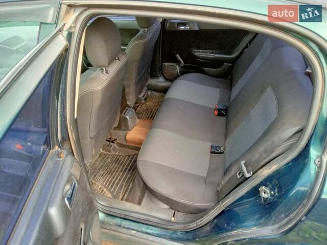 Зеленый Опель Астра, объемом двигателя 1.6 л и пробегом 266 тыс. км за 3700 $, фото 6 на Automoto.ua