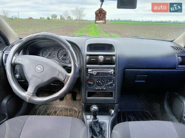 Зеленый Опель Астра, объемом двигателя 1.6 л и пробегом 266 тыс. км за 3700 $, фото 4 на Automoto.ua