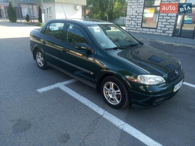 Зеленый Опель Астра, объемом двигателя 1.6 л и пробегом 269 тыс. км за 4600 $, фото 11 на Automoto.ua