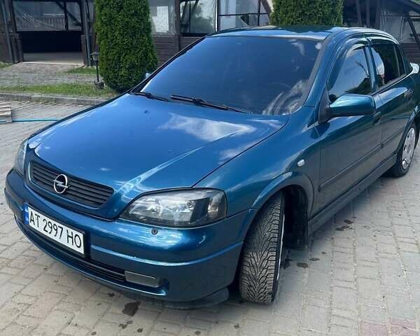Зеленый Опель Астра, объемом двигателя 1.4 л и пробегом 225 тыс. км за 3000 $, фото 4 на Automoto.ua