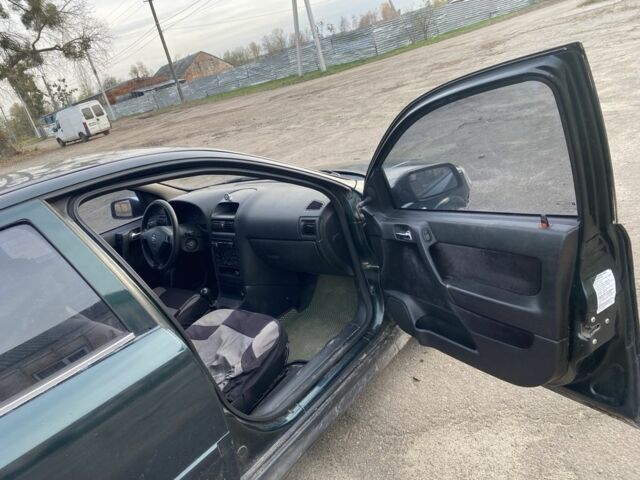 Зелений Опель Астра, об'ємом двигуна 1.6 л та пробігом 3 тис. км за 2200 $, фото 4 на Automoto.ua