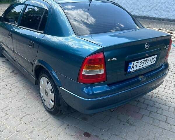 Зеленый Опель Астра, объемом двигателя 1.4 л и пробегом 225 тыс. км за 3000 $, фото 5 на Automoto.ua