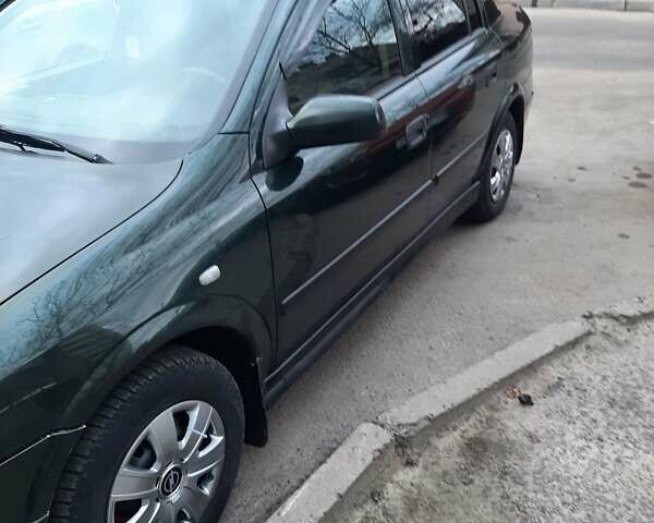 Зелений Опель Астра, об'ємом двигуна 1.39 л та пробігом 359 тис. км за 2200 $, фото 3 на Automoto.ua