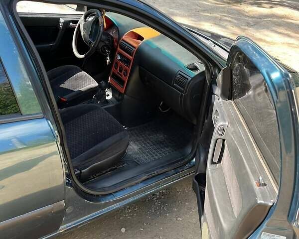 Зелений Опель Астра, об'ємом двигуна 1.4 л та пробігом 210 тис. км за 2000 $, фото 1 на Automoto.ua
