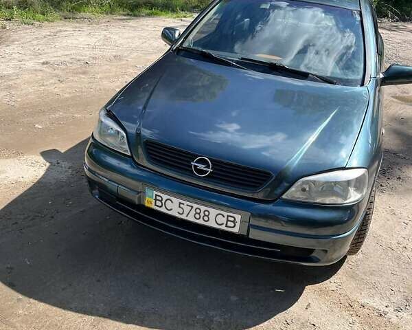 Зелений Опель Астра, об'ємом двигуна 1.4 л та пробігом 210 тис. км за 2000 $, фото 8 на Automoto.ua