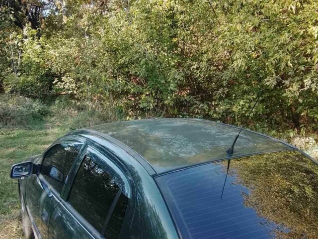 Зеленый Опель Астра, объемом двигателя 1.6 л и пробегом 320 тыс. км за 2043 $, фото 8 на Automoto.ua