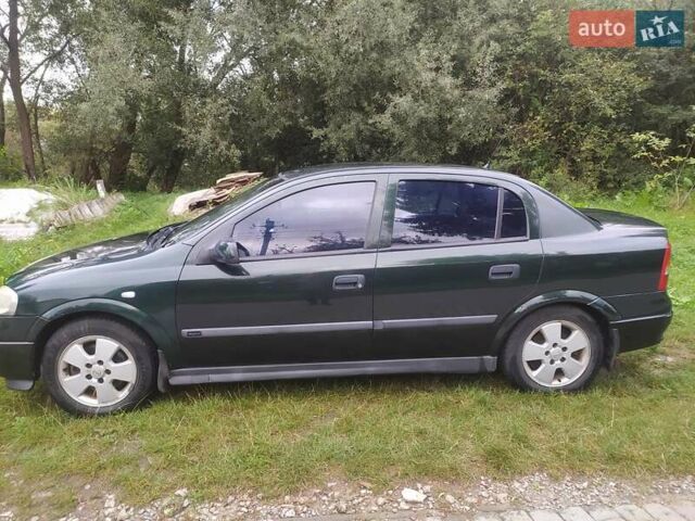 Зелений Опель Астра, об'ємом двигуна 1.99 л та пробігом 270 тис. км за 3600 $, фото 7 на Automoto.ua