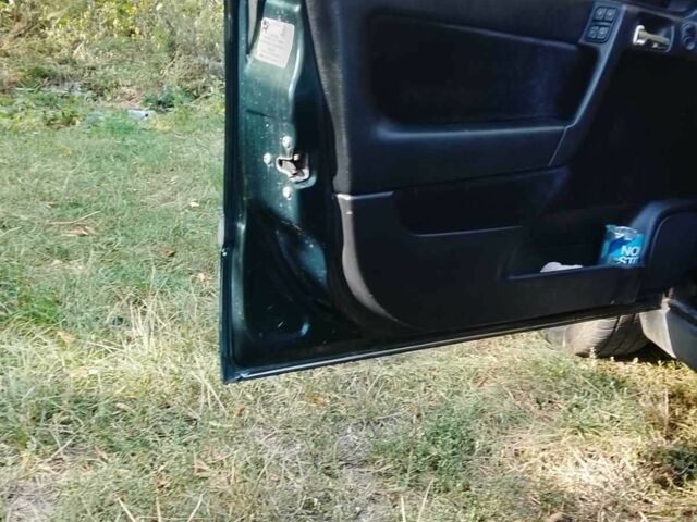 Зеленый Опель Астра, объемом двигателя 1.6 л и пробегом 320 тыс. км за 2043 $, фото 4 на Automoto.ua