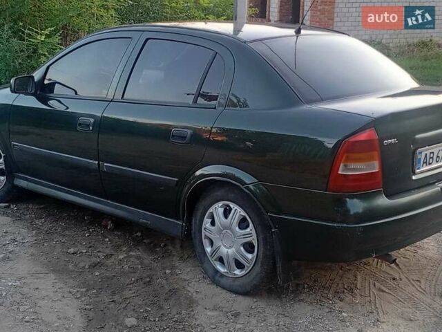 Зеленый Опель Астра, объемом двигателя 1.6 л и пробегом 260 тыс. км за 2800 $, фото 6 на Automoto.ua
