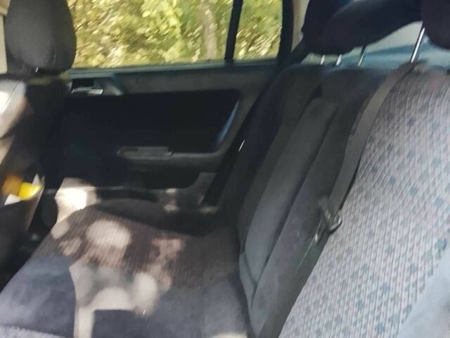 Зеленый Опель Астра, объемом двигателя 1.6 л и пробегом 320 тыс. км за 2043 $, фото 2 на Automoto.ua