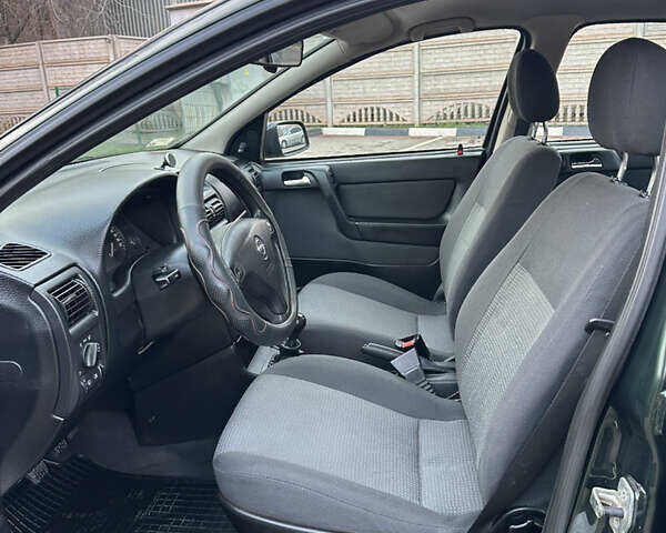 Зеленый Опель Астра, объемом двигателя 1.6 л и пробегом 174 тыс. км за 4800 $, фото 13 на Automoto.ua