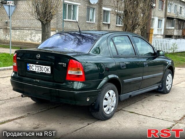 Зеленый Опель Астра, объемом двигателя 1.4 л и пробегом 242 тыс. км за 3300 $, фото 2 на Automoto.ua