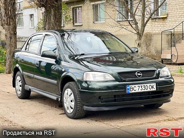 Зеленый Опель Астра, объемом двигателя 1.4 л и пробегом 242 тыс. км за 3300 $, фото 8 на Automoto.ua