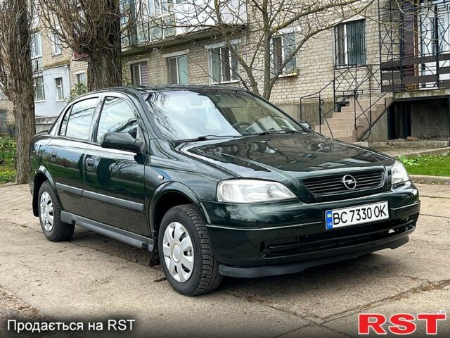 Зеленый Опель Астра, объемом двигателя 1.4 л и пробегом 242 тыс. км за 3300 $, фото 1 на Automoto.ua