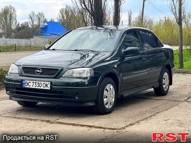 Зеленый Опель Астра, объемом двигателя 1.4 л и пробегом 242 тыс. км за 3300 $, фото 5 на Automoto.ua
