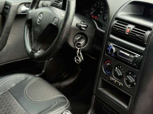 Зеленый Опель Астра, объемом двигателя 1.6 л и пробегом 300 тыс. км за 3650 $, фото 6 на Automoto.ua