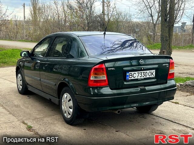 Зеленый Опель Астра, объемом двигателя 1.4 л и пробегом 242 тыс. км за 3300 $, фото 3 на Automoto.ua