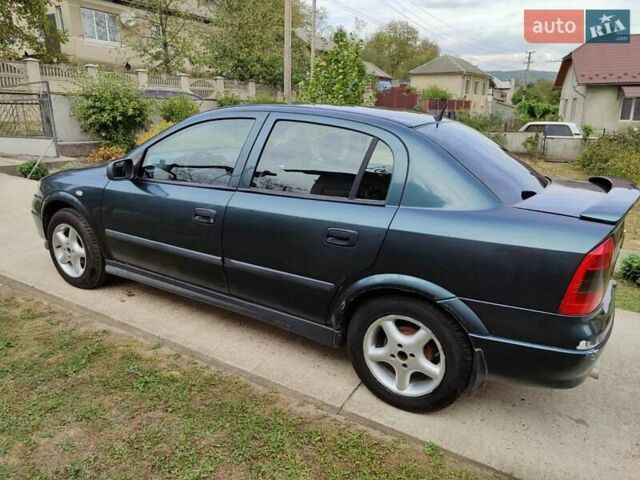 Зеленый Опель Астра, объемом двигателя 1.4 л и пробегом 182 тыс. км за 3500 $, фото 2 на Automoto.ua