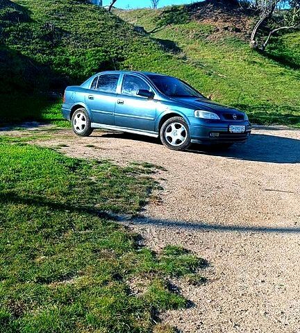 Зеленый Опель Астра, объемом двигателя 1.6 л и пробегом 250 тыс. км за 4250 $, фото 4 на Automoto.ua