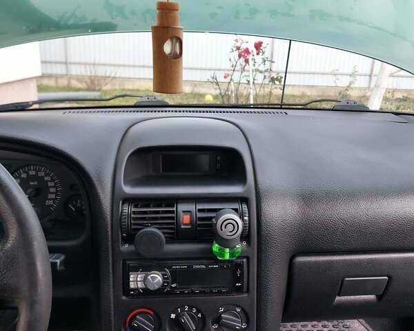 Зелений Опель Астра, об'ємом двигуна 1.39 л та пробігом 296 тис. км за 3500 $, фото 12 на Automoto.ua