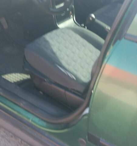 Зеленый Опель Астра, объемом двигателя 1.6 л и пробегом 300 тыс. км за 3000 $, фото 2 на Automoto.ua