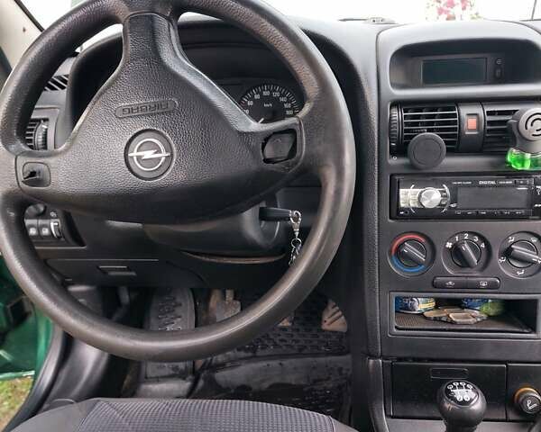 Зелений Опель Астра, об'ємом двигуна 1.39 л та пробігом 296 тис. км за 3500 $, фото 13 на Automoto.ua