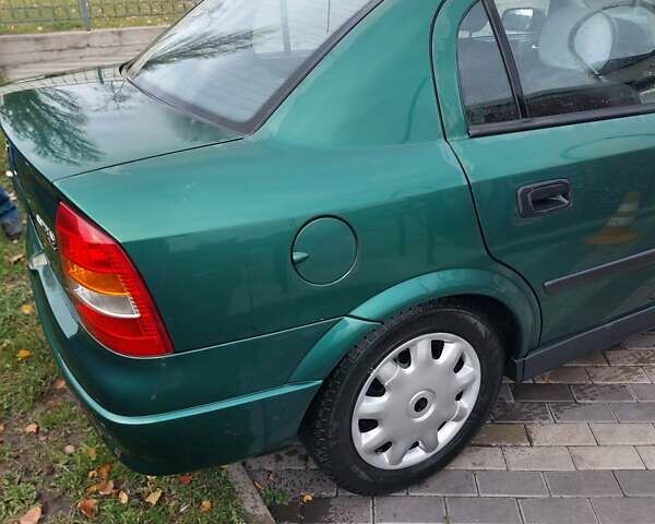 Зелений Опель Астра, об'ємом двигуна 1.39 л та пробігом 296 тис. км за 3500 $, фото 6 на Automoto.ua