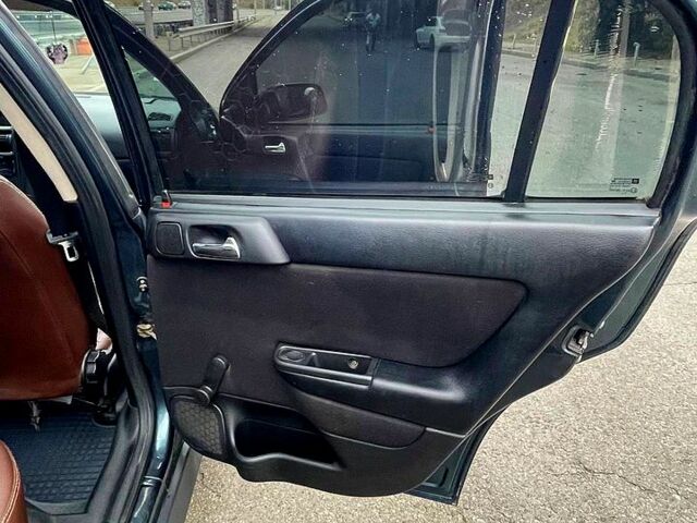 Зеленый Опель Астра, объемом двигателя 1.4 л и пробегом 235 тыс. км за 3000 $, фото 7 на Automoto.ua