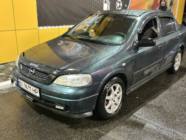 Зеленый Опель Астра, объемом двигателя 1.6 л и пробегом 320 тыс. км за 3600 $, фото 6 на Automoto.ua