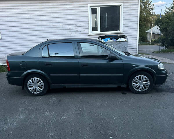 Зеленый Опель Астра, объемом двигателя 1.4 л и пробегом 350 тыс. км за 1999 $, фото 4 на Automoto.ua