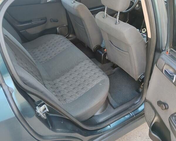 Зеленый Опель Астра, объемом двигателя 1.6 л и пробегом 230 тыс. км за 3500 $, фото 17 на Automoto.ua