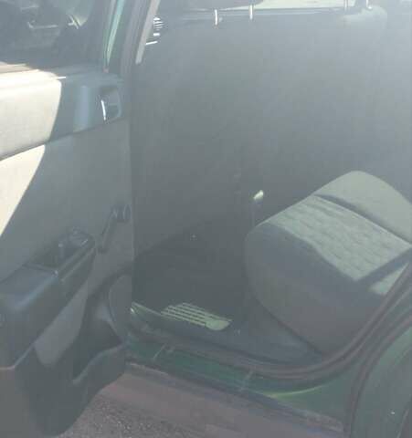 Зеленый Опель Астра, объемом двигателя 1.6 л и пробегом 300 тыс. км за 3000 $, фото 1 на Automoto.ua