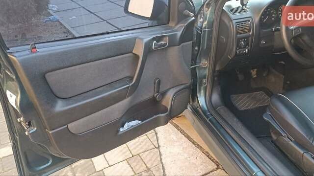 Зеленый Опель Астра, объемом двигателя 1.4 л и пробегом 320 тыс. км за 3400 $, фото 7 на Automoto.ua