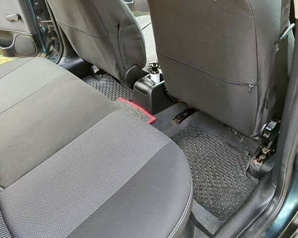 Зеленый Опель Астра, объемом двигателя 1.4 л и пробегом 182 тыс. км за 3500 $, фото 12 на Automoto.ua