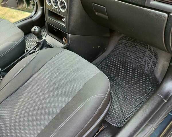 Зеленый Опель Астра, объемом двигателя 1.4 л и пробегом 182 тыс. км за 3500 $, фото 13 на Automoto.ua