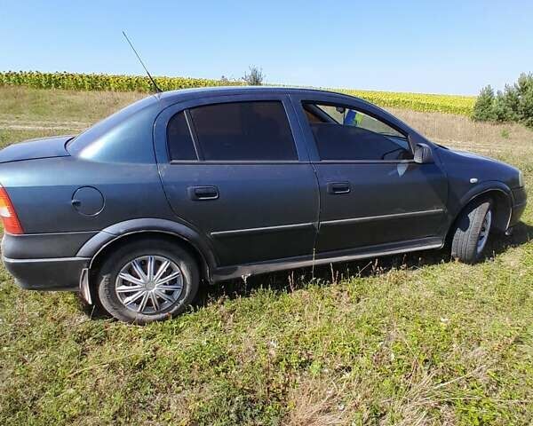 Зеленый Опель Астра, объемом двигателя 1.4 л и пробегом 290 тыс. км за 3150 $, фото 4 на Automoto.ua