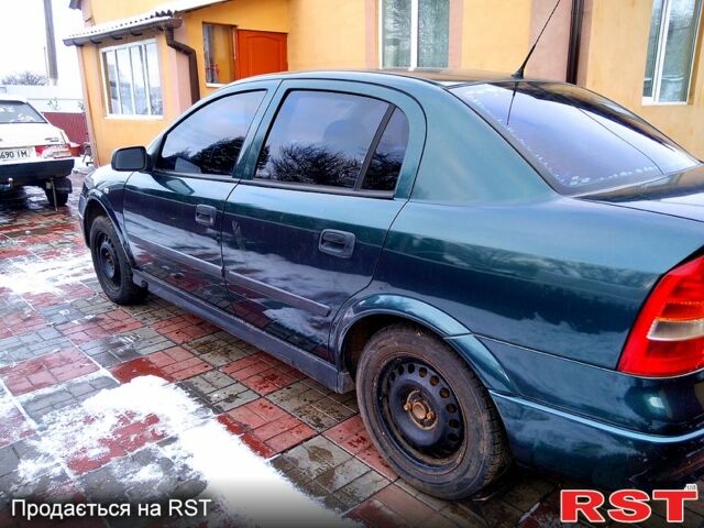 Зелений Опель Астра, об'ємом двигуна 1.6 л та пробігом 276 тис. км за 1100 $, фото 2 на Automoto.ua