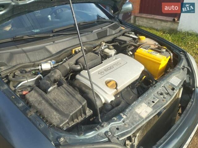 Зеленый Опель Астра, объемом двигателя 1.6 л и пробегом 180 тыс. км за 3500 $, фото 11 на Automoto.ua