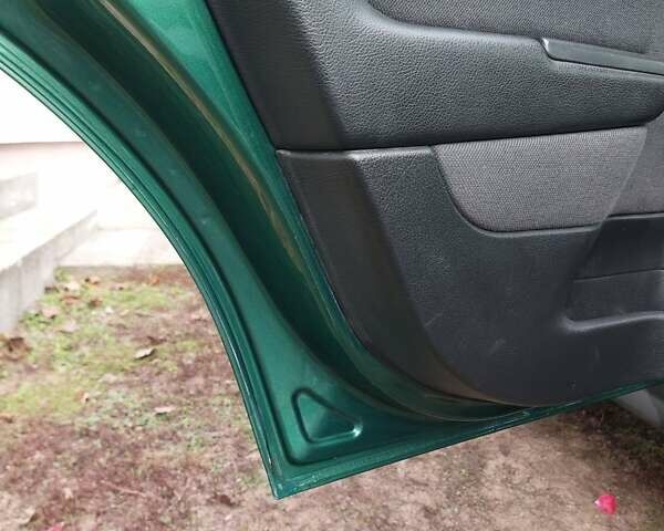 Зелений Опель Астра, об'ємом двигуна 1.39 л та пробігом 296 тис. км за 3500 $, фото 9 на Automoto.ua